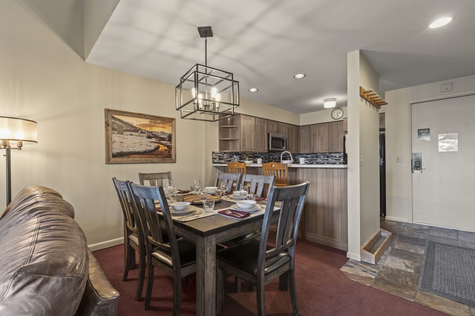 Snow Flower 127 has an open concept kitchen and dining area with seating for 6 at the dining table.