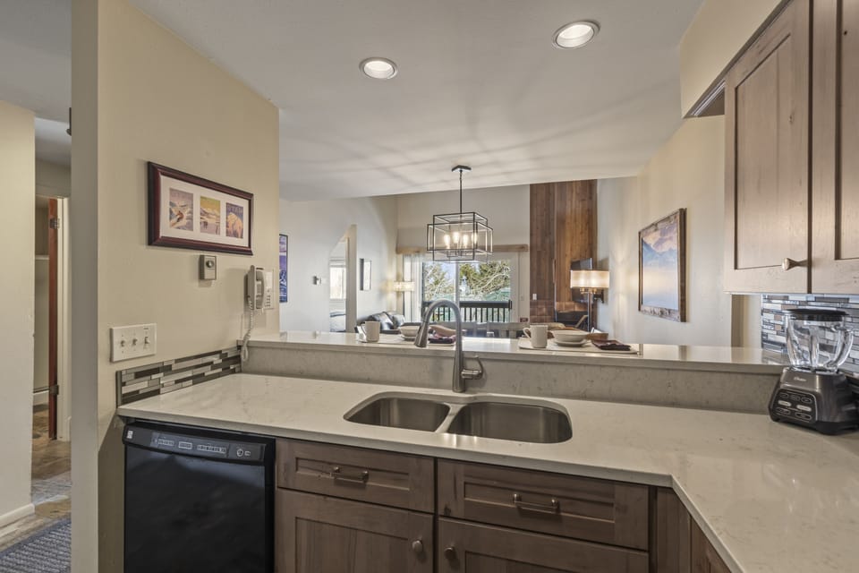 Snow Flower 127 has a breakfast bar that overlooks the open concept living area.