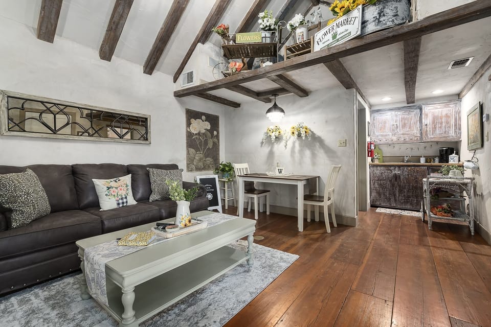 Gorgeous living room with wood beams from The Hummingbird Haus built in 1770!