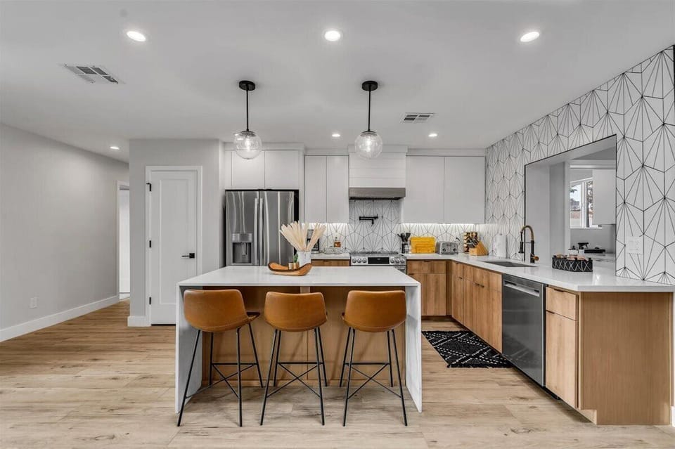 Open kitchen with large island.  Includes all you need to make gourmet meals.