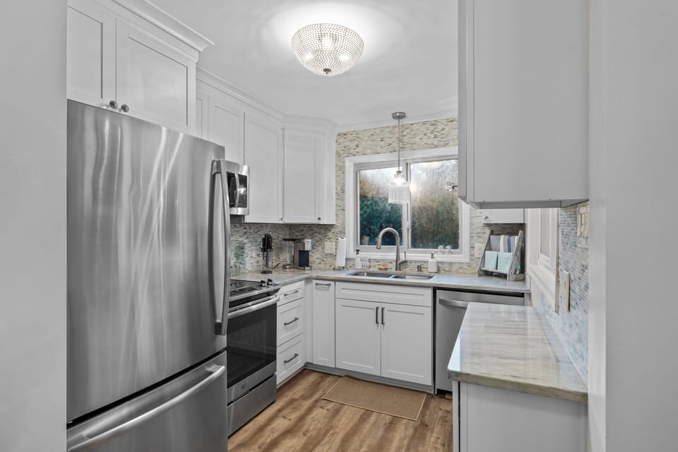 Kitchen offers stainless appliances with dishwasher!
