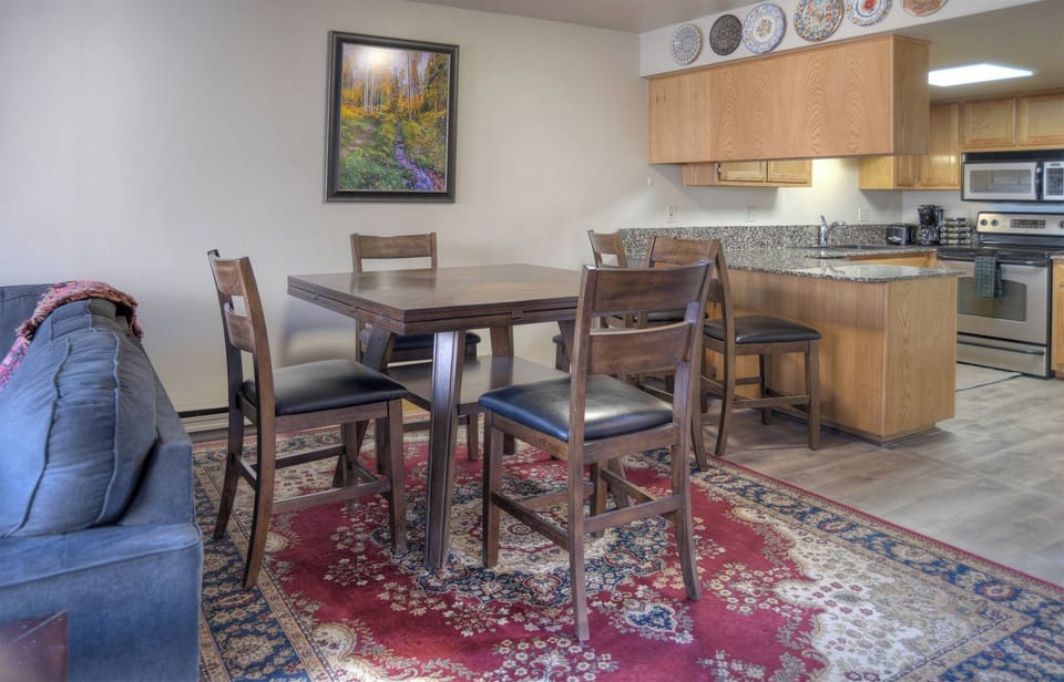 Dining Area Full Kitchen with Bar Seating