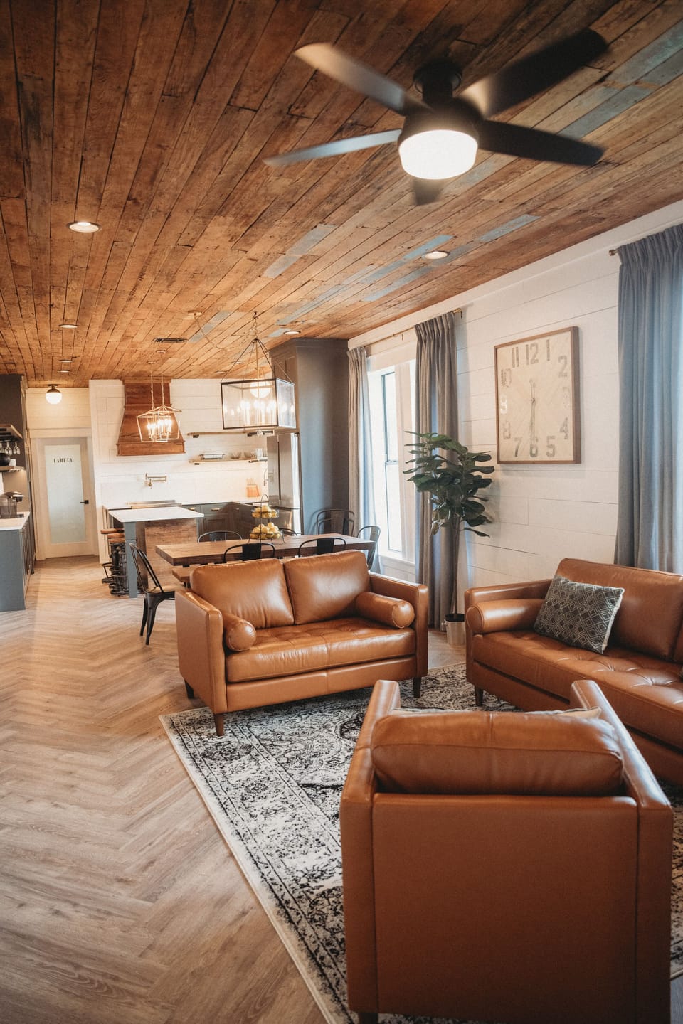 Relax on the leather sofa set in the living room.