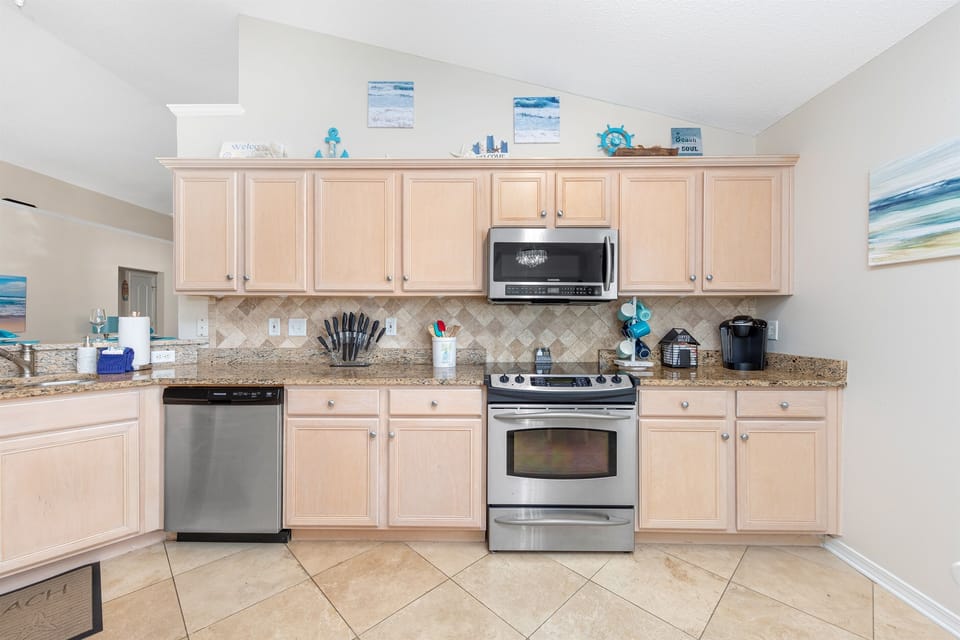 Unleash your culinary skills in our generously equipped, spacious kitchen for preparing delicious meals to savor and enjoy.