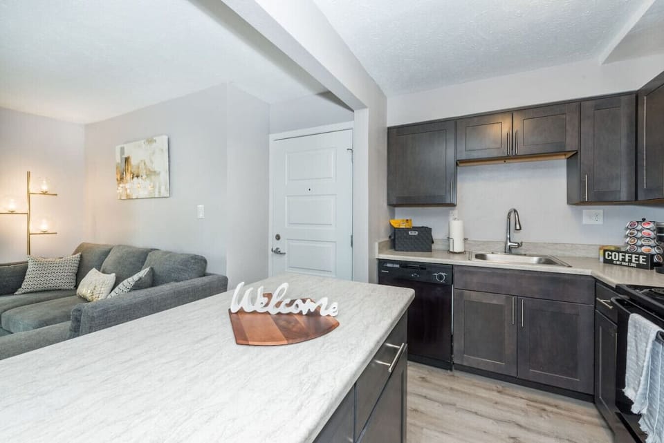 Kitchen area features a dedicated island
