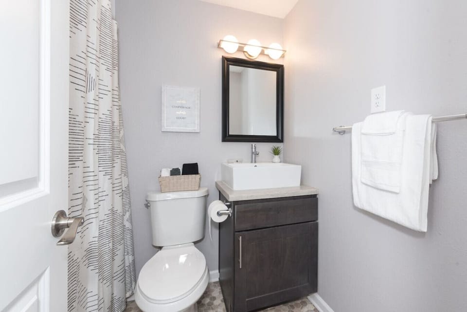 Full bathroom stocked with essentials