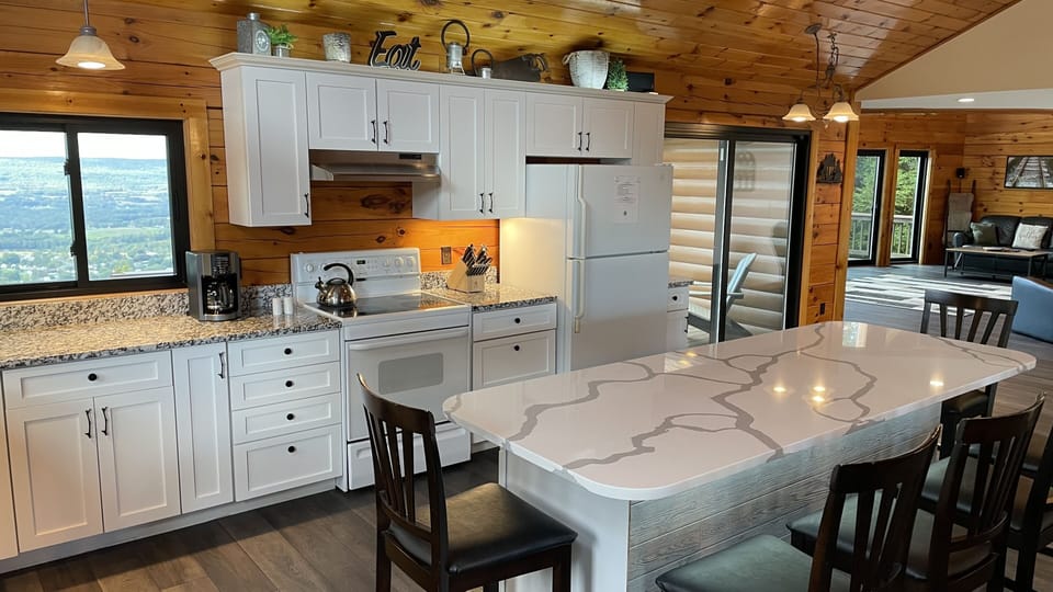 Massive kitchen island and breakfast bar. 