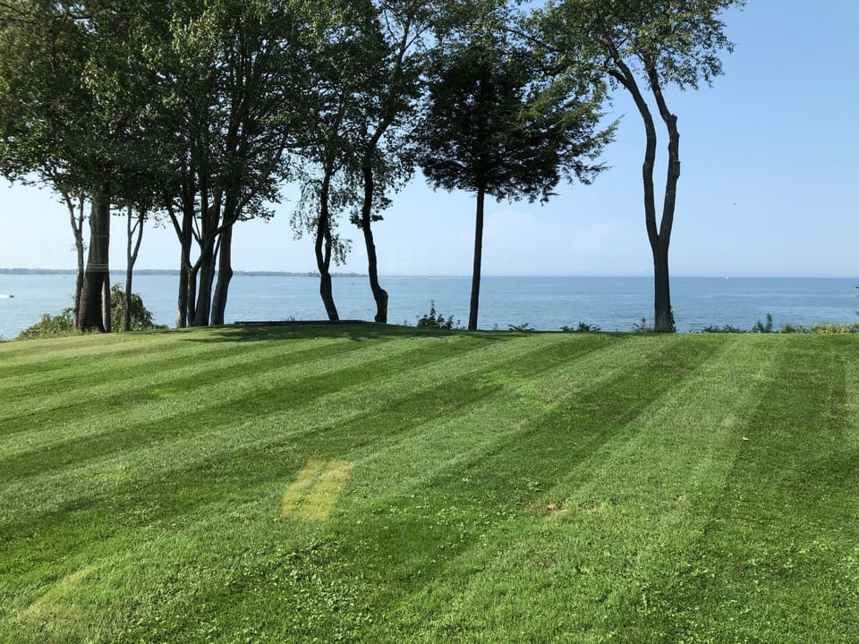 Private back yard across with view of Bay, Presque Isle and beyond 