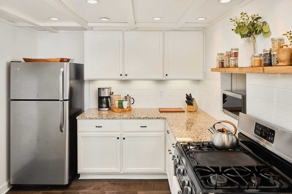 Historic cabin has been renovated with a fully-stocked kitchen with gas stove