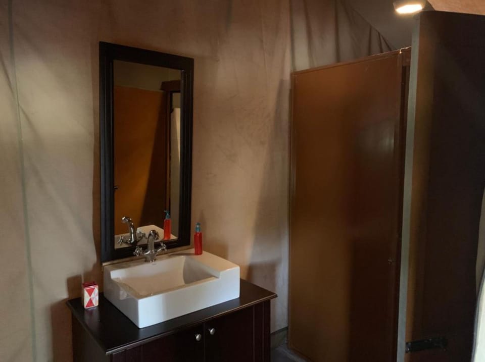 Shower, free toiletries, slippers, towels
