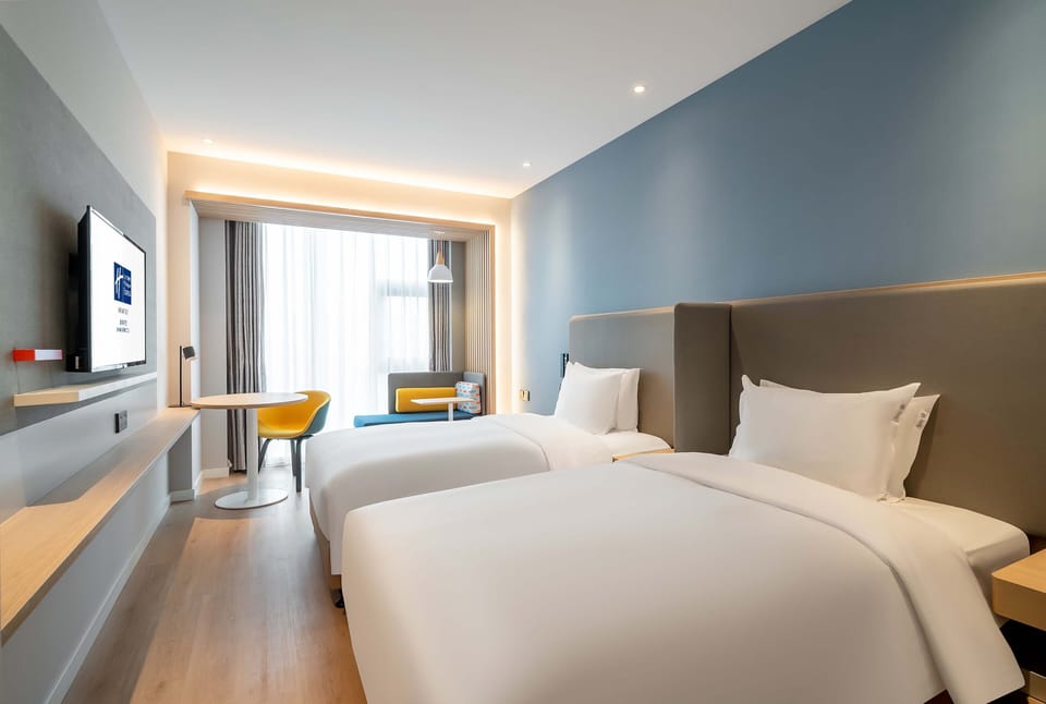 Standard Room, 2 Twin Beds | In-room safe, desk, soundproofing, iron/ironing board