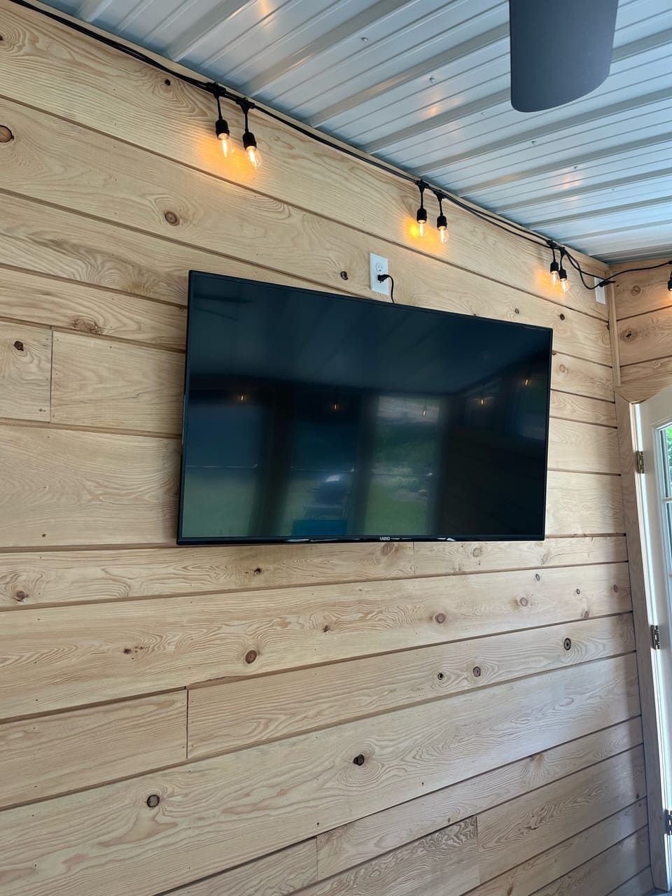 50in TV in the sunroom 