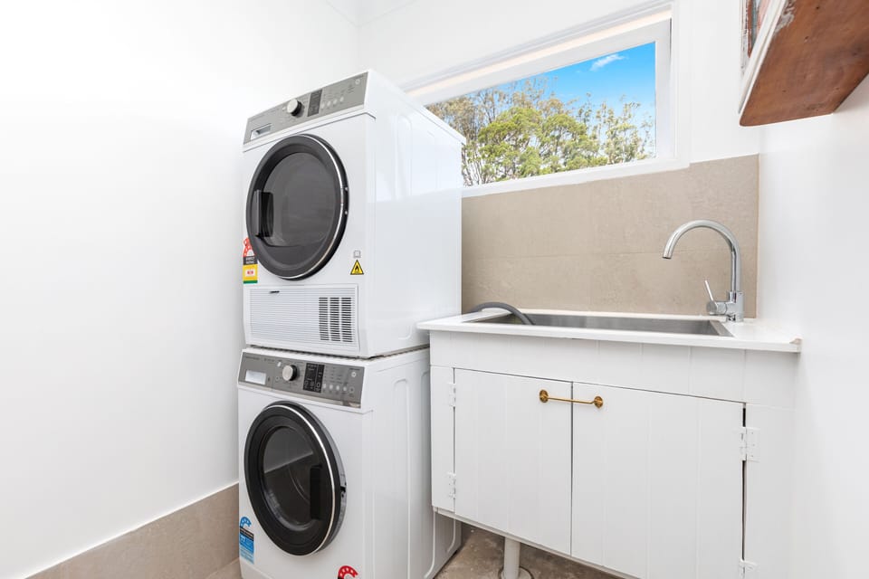 Laundry with washer and dryer and all your laundry basics