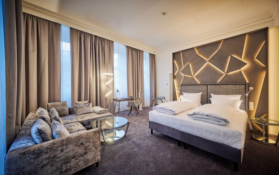 Deluxe Suite, 1 King Bed, Bathtub, City View | Premium bedding, down comforters, minibar, in-room safe