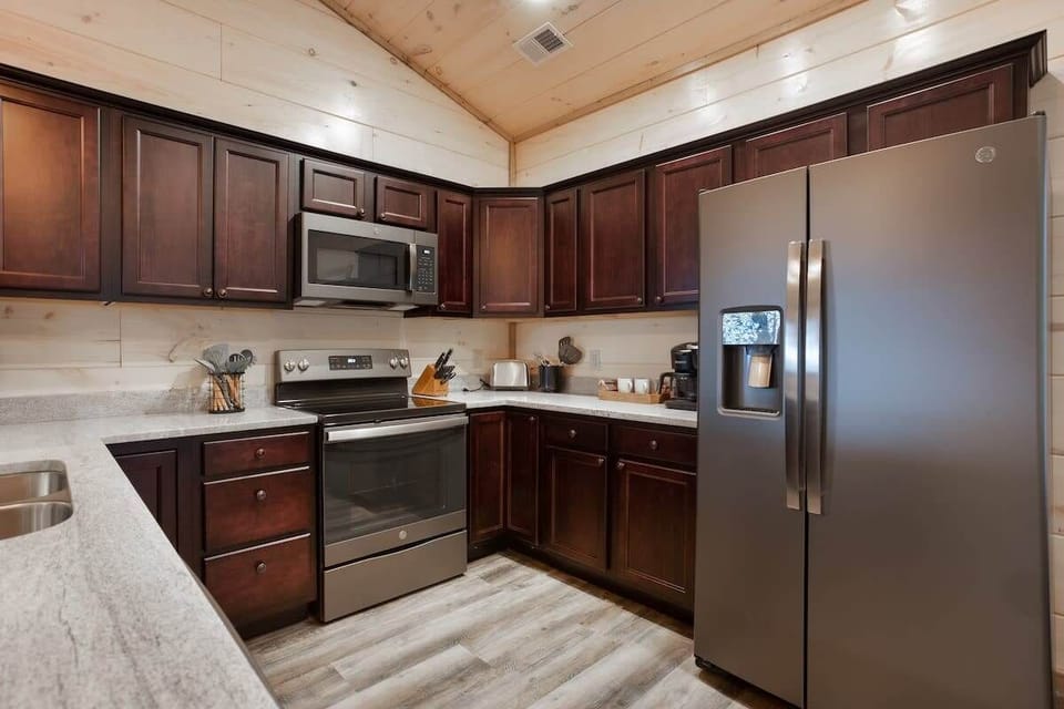 Kitchen Complete With Granite Countertops And Stainless Steel Appliances!