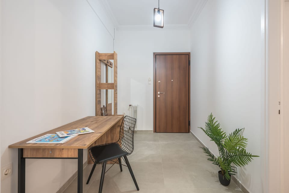 City Apartment | Living area | 41-inch flat-screen TV with satellite channels, TV