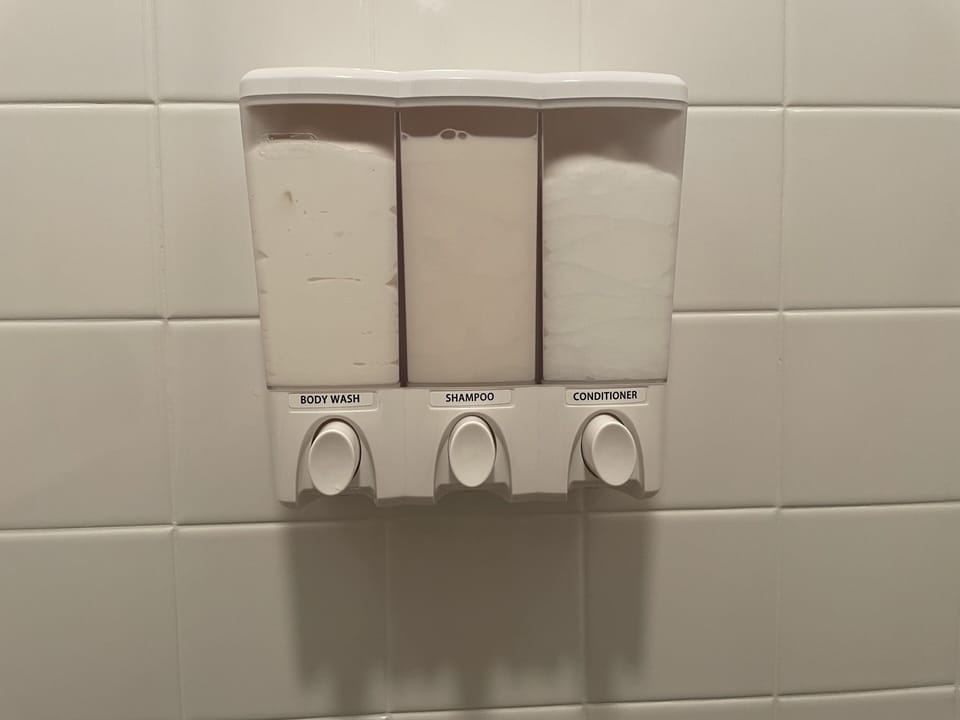 Master Bath and Upstairs Bath offer shampoo and soap dispenser in shower 