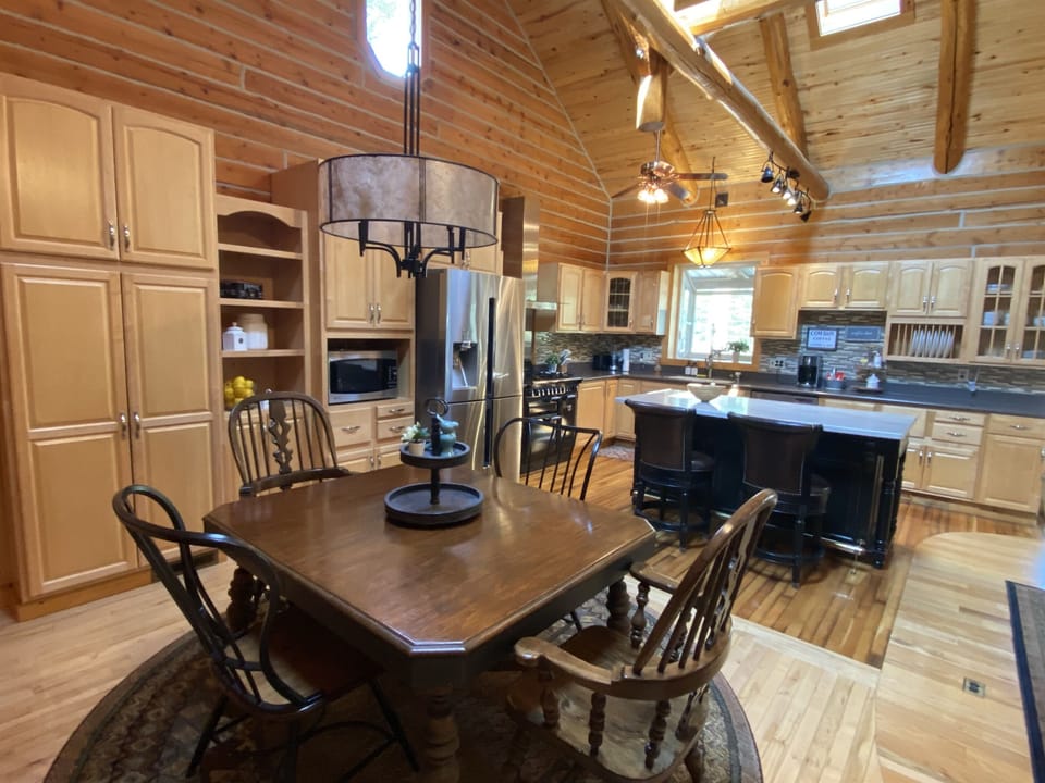 Gorgeous and spacious kitchen with counter seating for two.