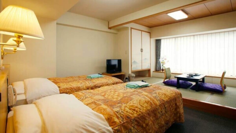 Traditional Triple Room, Smoking | In-room safe, desk, free WiFi, bed sheets