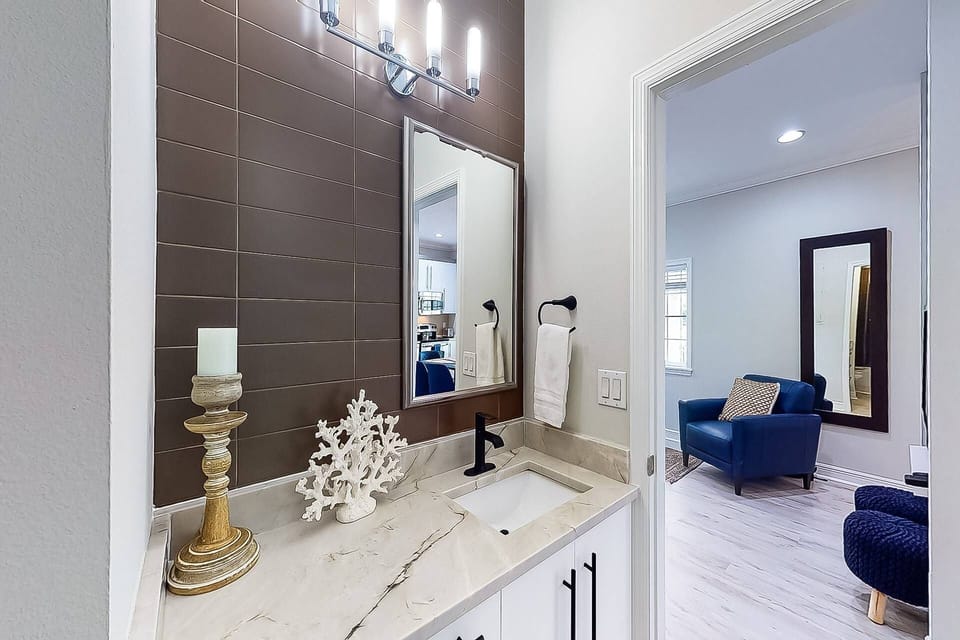 Guest bathroom off the living room all new as of 10/21.  Includes tiled shower with tub.