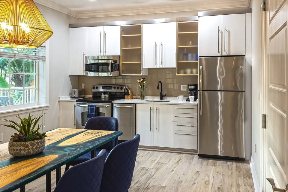 The Beach Club kitchen is modern and bright.  New cabinets with updated stainless steel appliances.