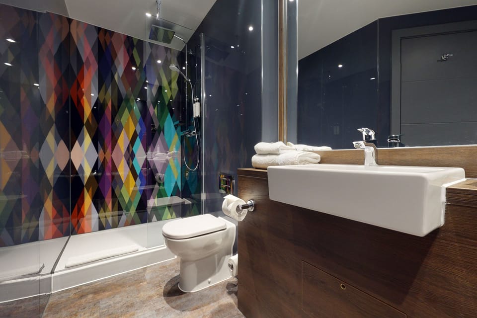 Shower, rainfall showerhead, eco-friendly toiletries, hair dryer