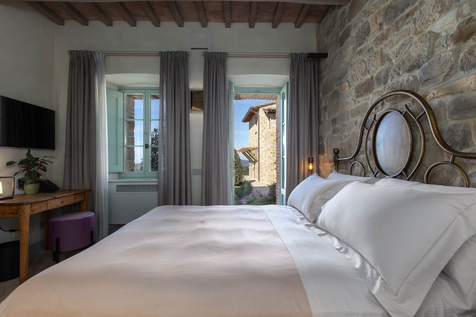 Deluxe Room, Patio | Premium bedding, down comforters, pillowtop beds, minibar