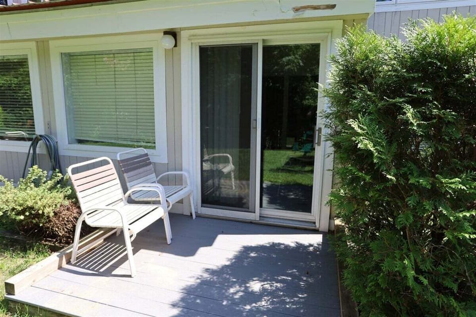 Patio next to Snow Brook at Condo in Waterville Valley