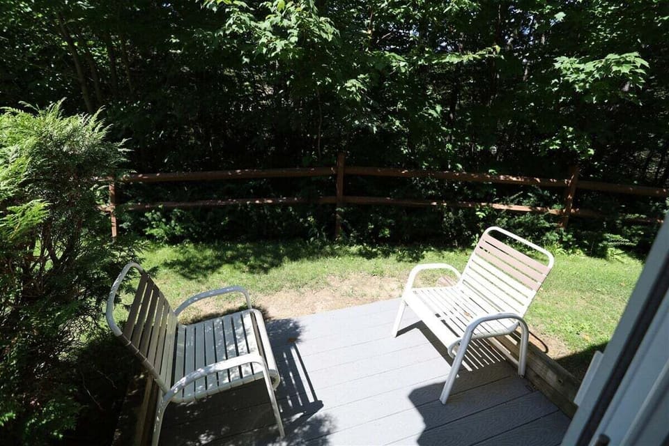 Patio next to Snow Brook at Condo in Waterville Valley