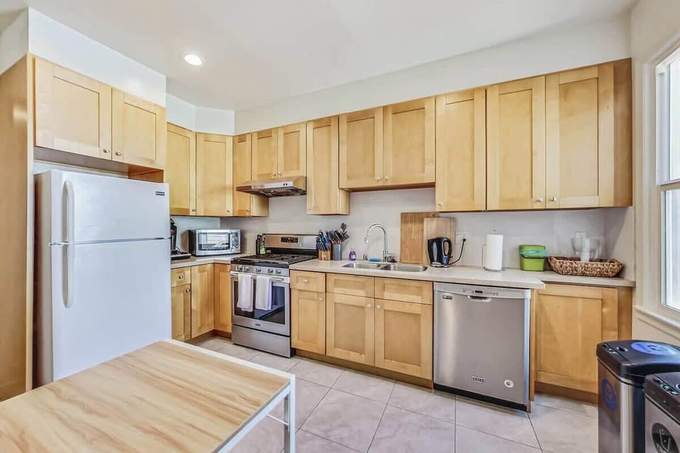 Well appointed kitchen with a dining table for 4.  We provide coffee, tea, sweeteners and dishwasher pods.