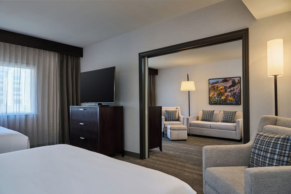 Suite, 2 Queen Beds | In-room safe, desk, blackout drapes, iron/ironing board