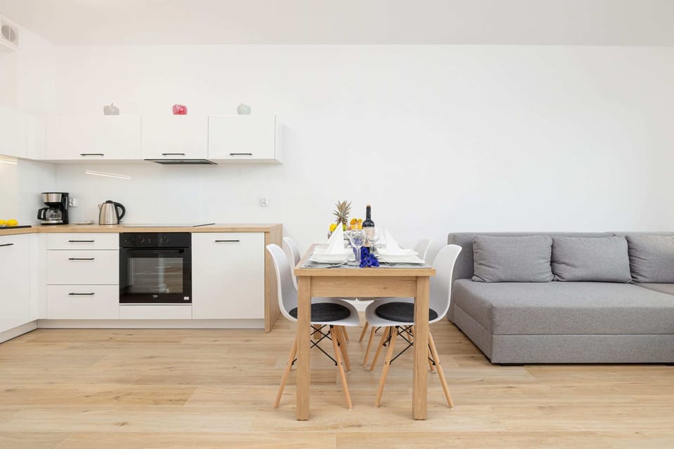 Dining area with a table for four in a modern design