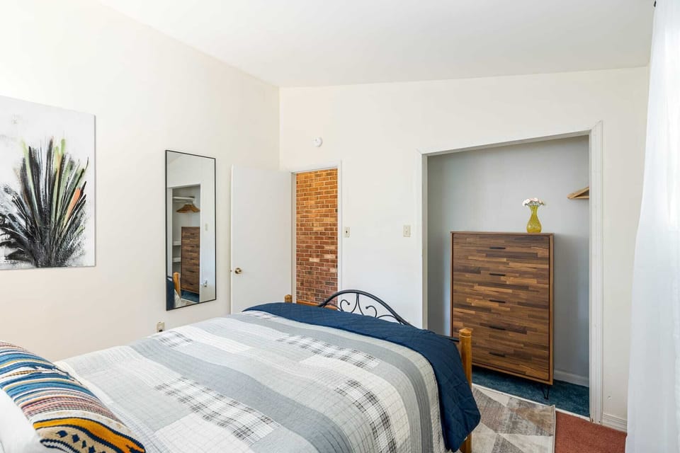 Bedroom 1 - Queen Bed and plenty of storage