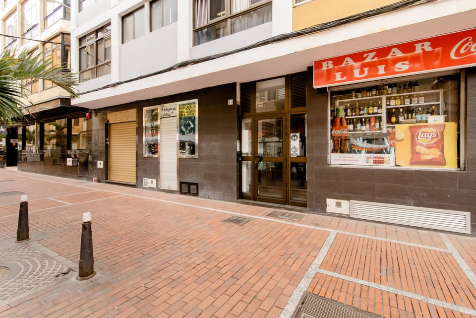 Grocery downstairs, pedestrian street connected to the beach promenade