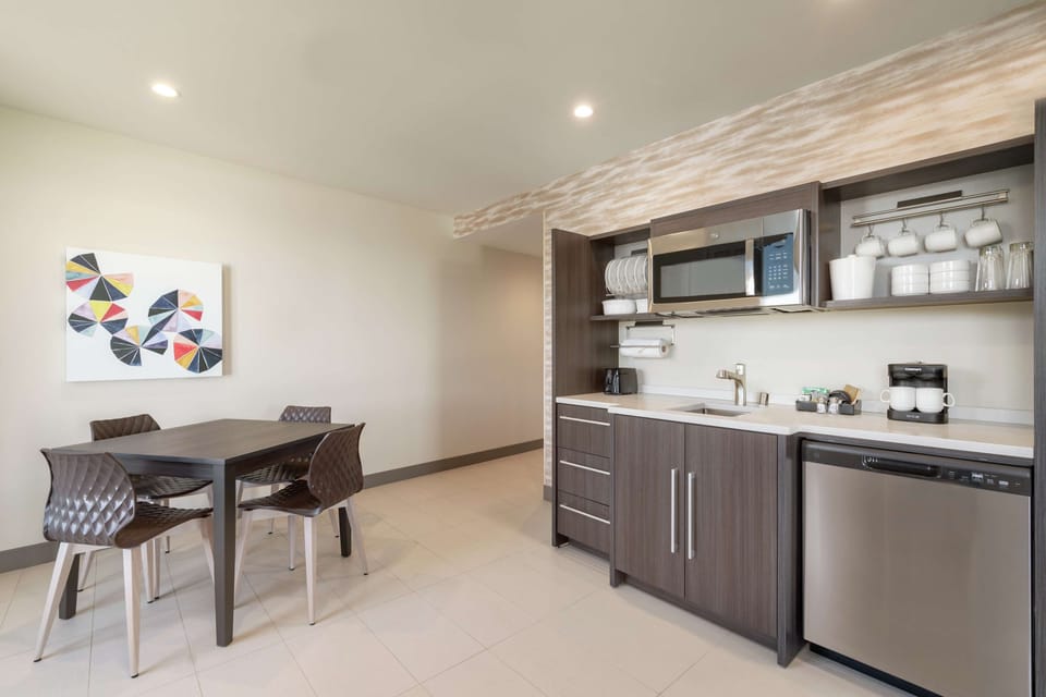 Suite, 1 Bedroom, 1 King & Sofa Bed, Balcony | Private kitchen | Coffee/tea maker