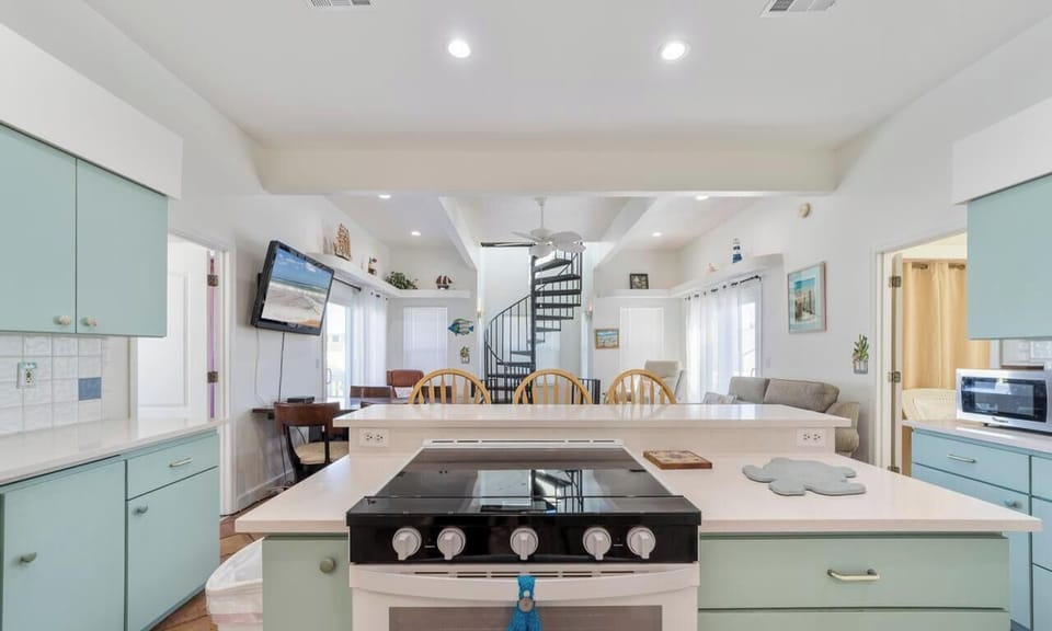 Bright, airy kitchen with modern appliances and cozy dining nook