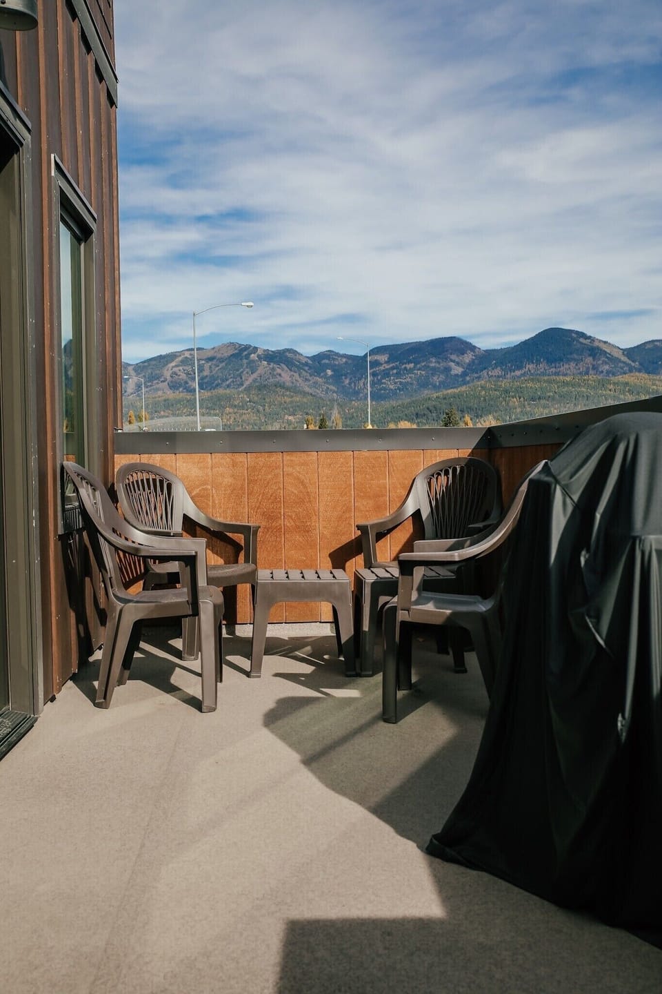 Otherwise of balcony with views of Whitefish Mountain Resort. Full size grille 