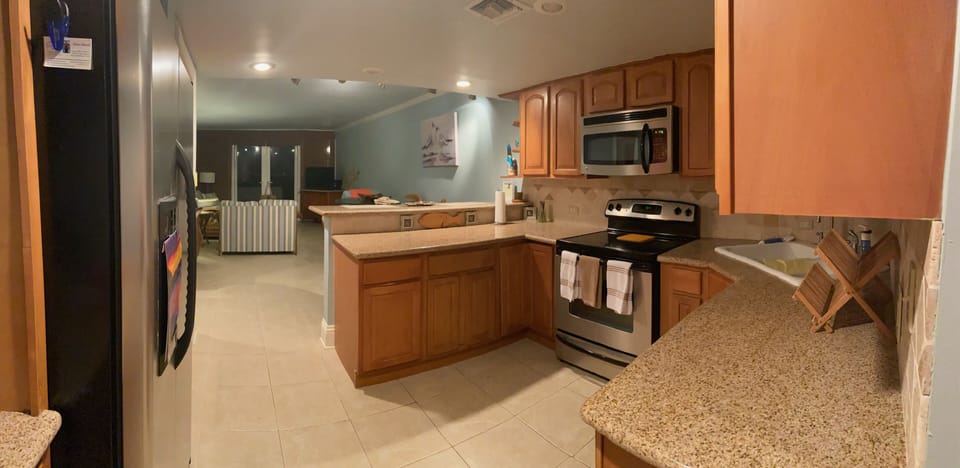 Fully equipped kitchen, microwave, stove, dishwasher, coffee maker