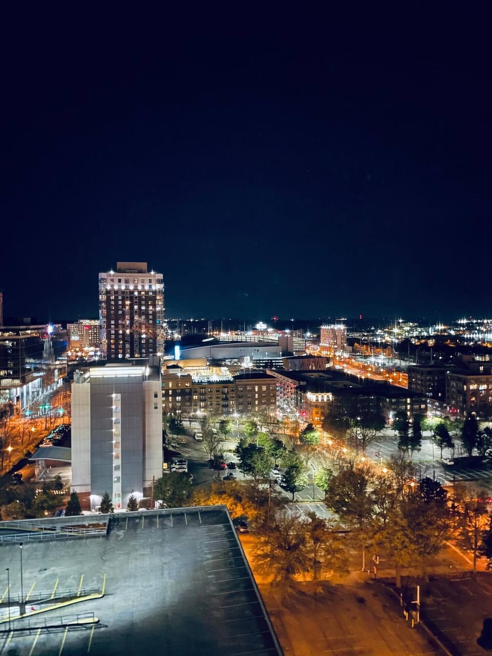 Panoramic night skyline views glowing across the city