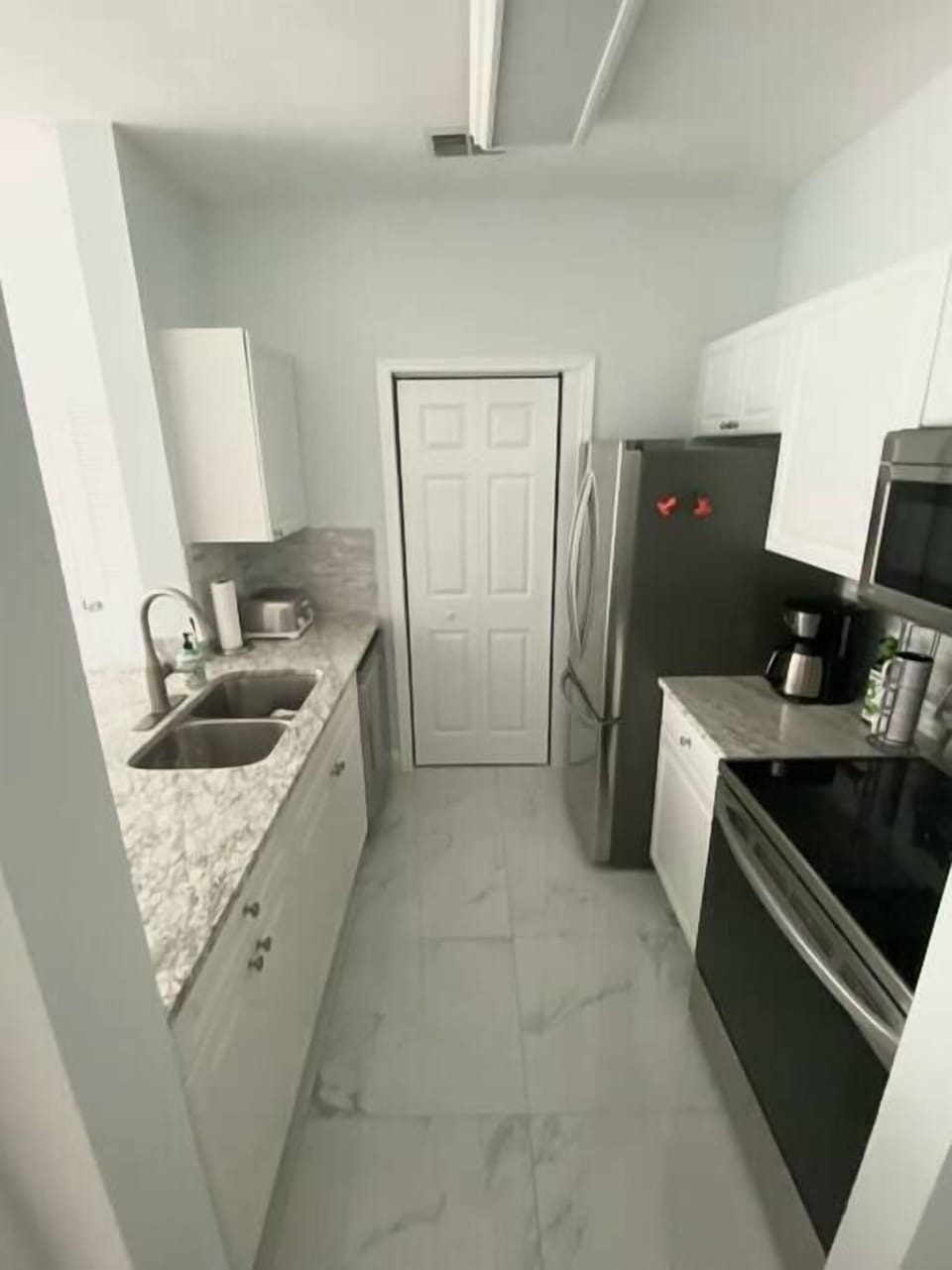 Kitchen, washer/dryer behind closet