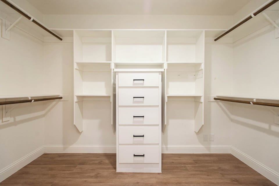 The primary suite features a walk-in closet available for your use.
