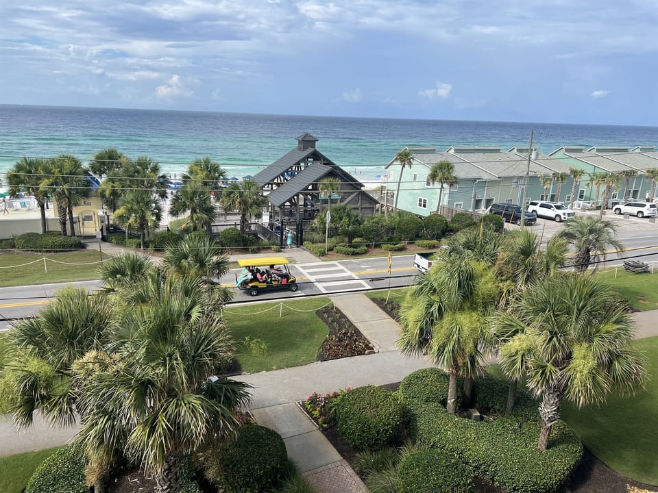 Check out the home's 6-seater golf cart cruising the Emerald Coast - this could be you!