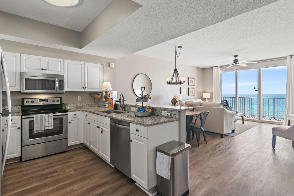 Kitchen has granite countertops, stainless appliances - fully stocked with more than the basics so you and your group can prepare delicious meals while overlooking the Gulf of Mexico!