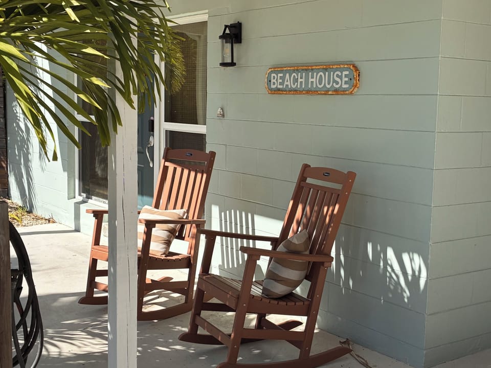 Welcome! Front porch with rocking chairs