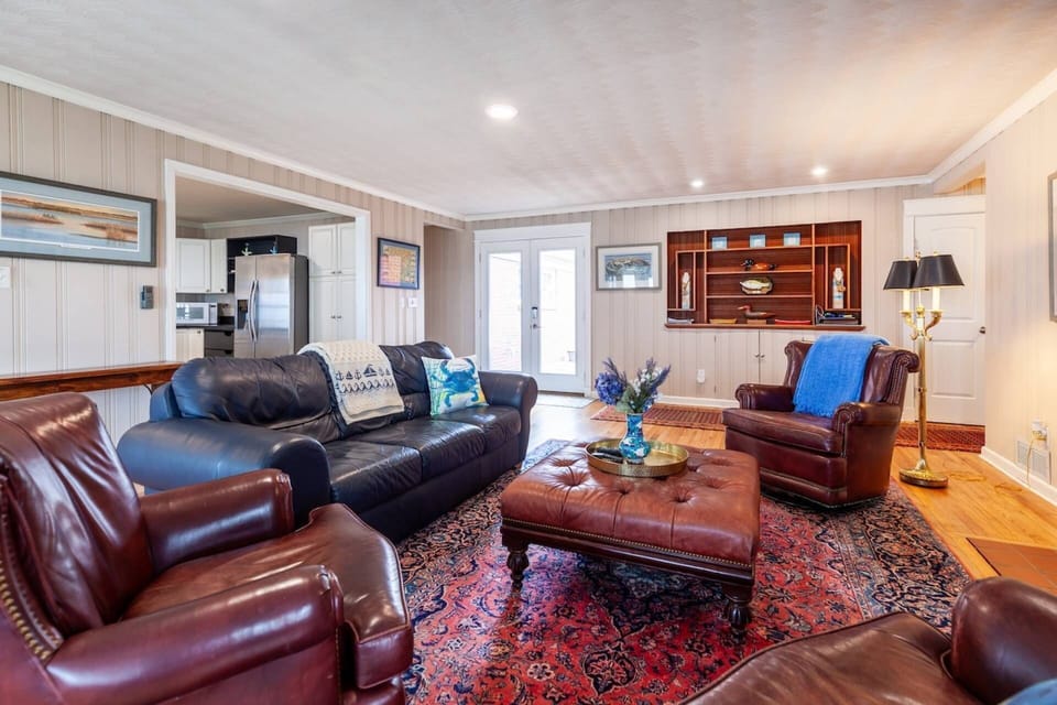 You will enter the warm home via the foyer overlooking the family room.