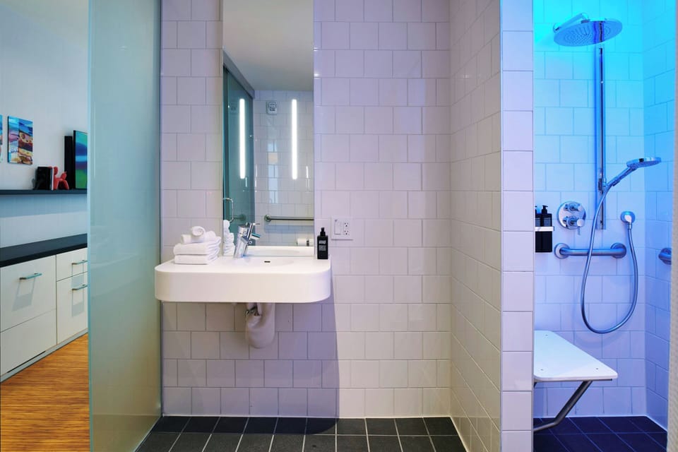 Room, 1 King Bed (Mobility Accessible, Roll-In Shower) | Premium bedding, pillowtop beds, in-room safe, desk