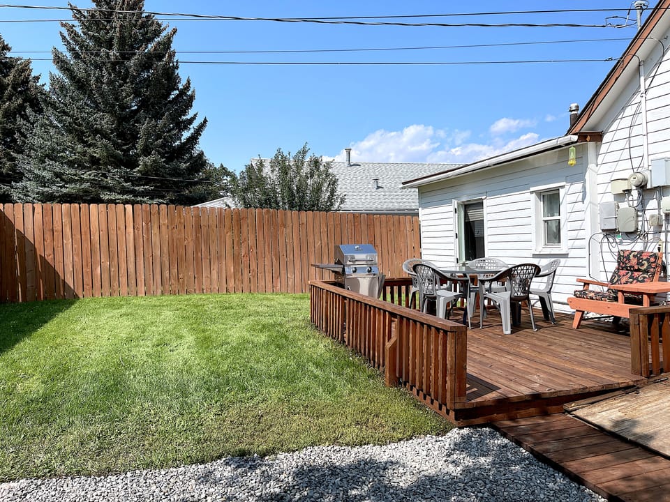 The peaceful, fully fenced backyard provides a secure spot for your family and four-legged family members to enjoy