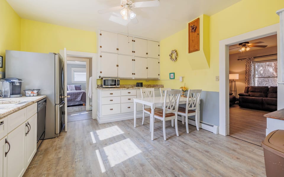 The large dine-in kitchen with updated appliances is well-equipped for easy meal prep and cleanup