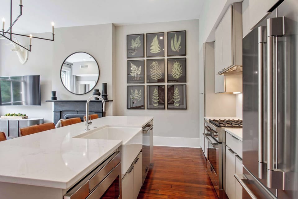 Kitchen 1 | Kitchen Island Open to Living Area | Unit 3 — Third Floor of Building — Unit on One Level
