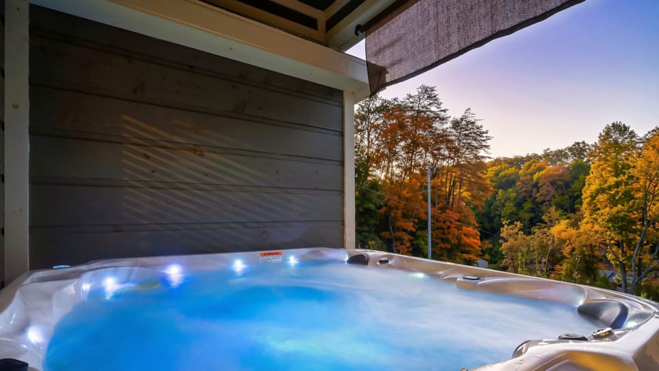 Take in the beauty of autumn from the hot tub, with colorful Smoky Mountain foliage creating a stunning backdrop.